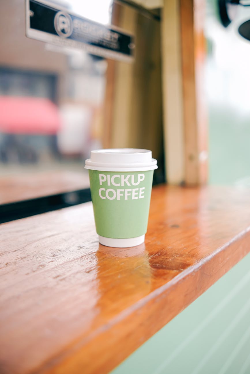 text on coffee cup on counter showcasing corporate branding in pretoria